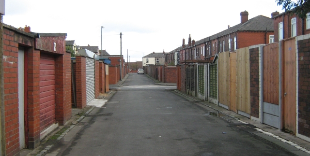 a back street behind terraced houses